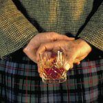 Schot met glas whisky